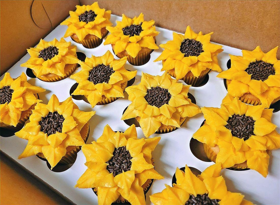Tray of sunflower cupcakes
