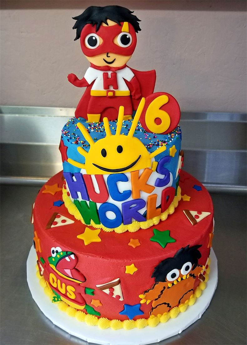 Ryan's World themed tiered birthday cake