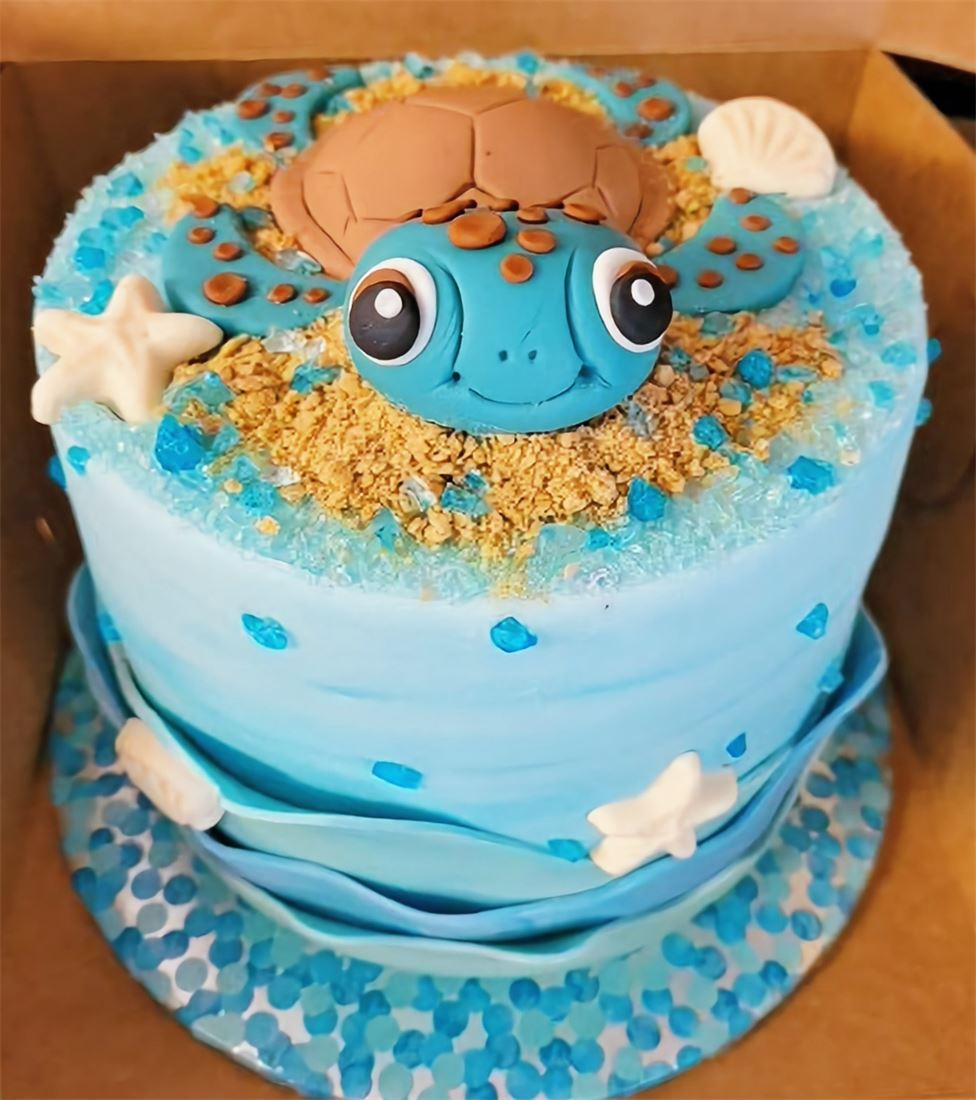 Sea turtle themed birthday cake in blue