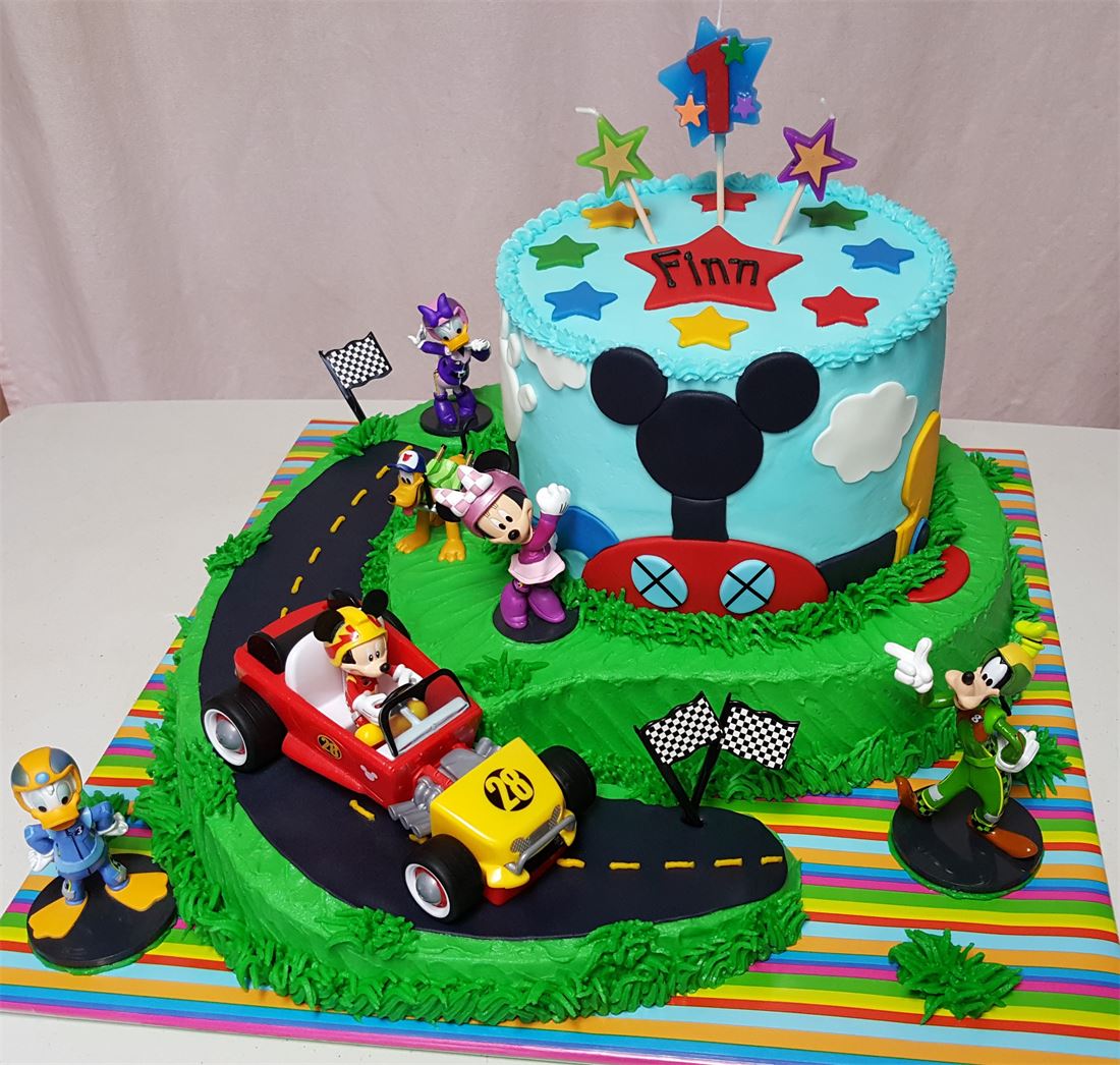 Mickey Mouse and vehicles themed tiered birthday cake