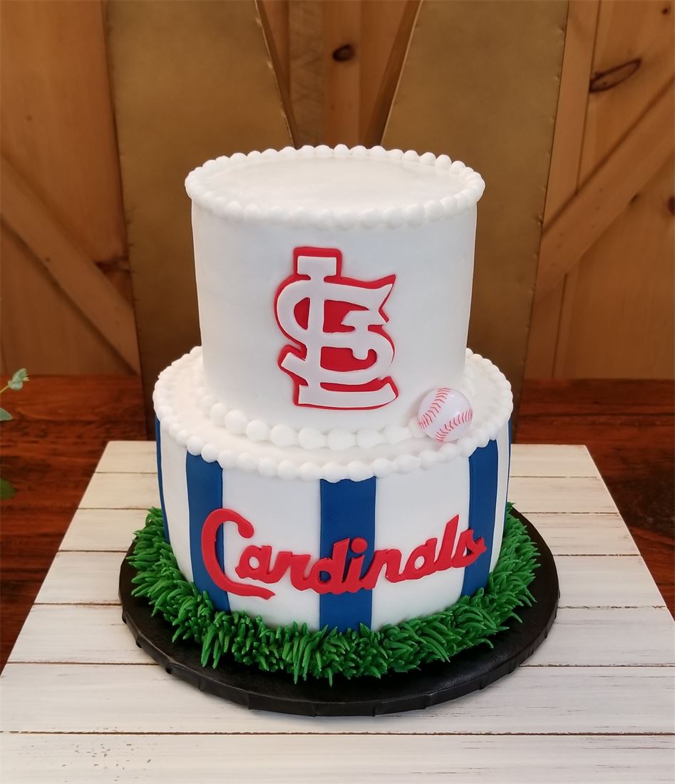 St Louis Cardinals groom cake on a green baseball field base